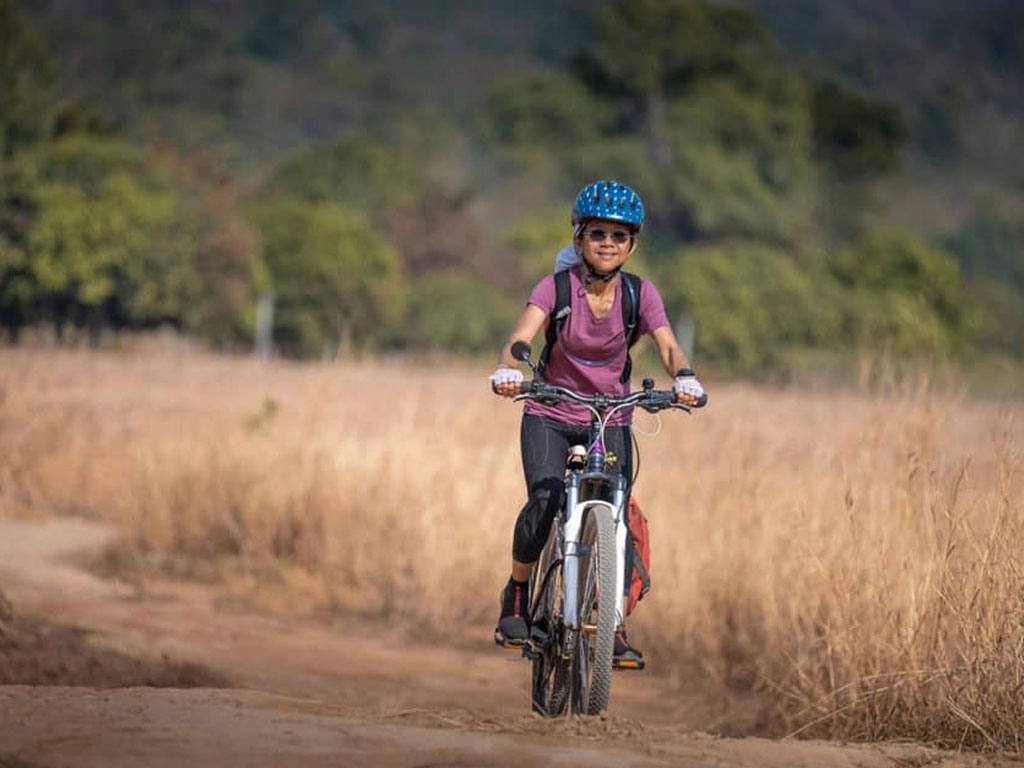Nok, expert Bangkok bike tour guide, ready to lead cycling adventure through Thailand